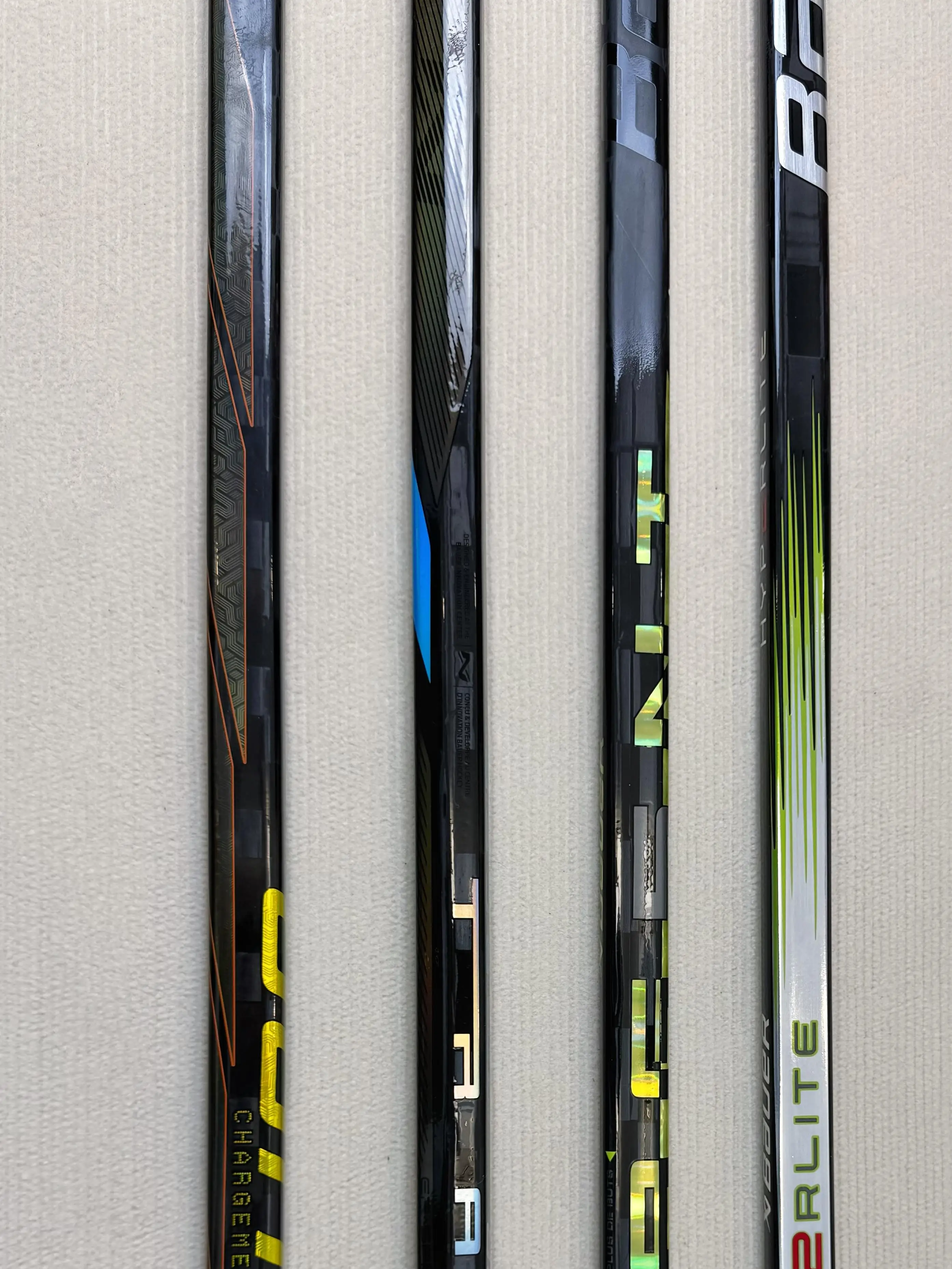 3K and 12K custom hockey sticks for training are made of fiberglass carbon and are cheap for junior youth and child players