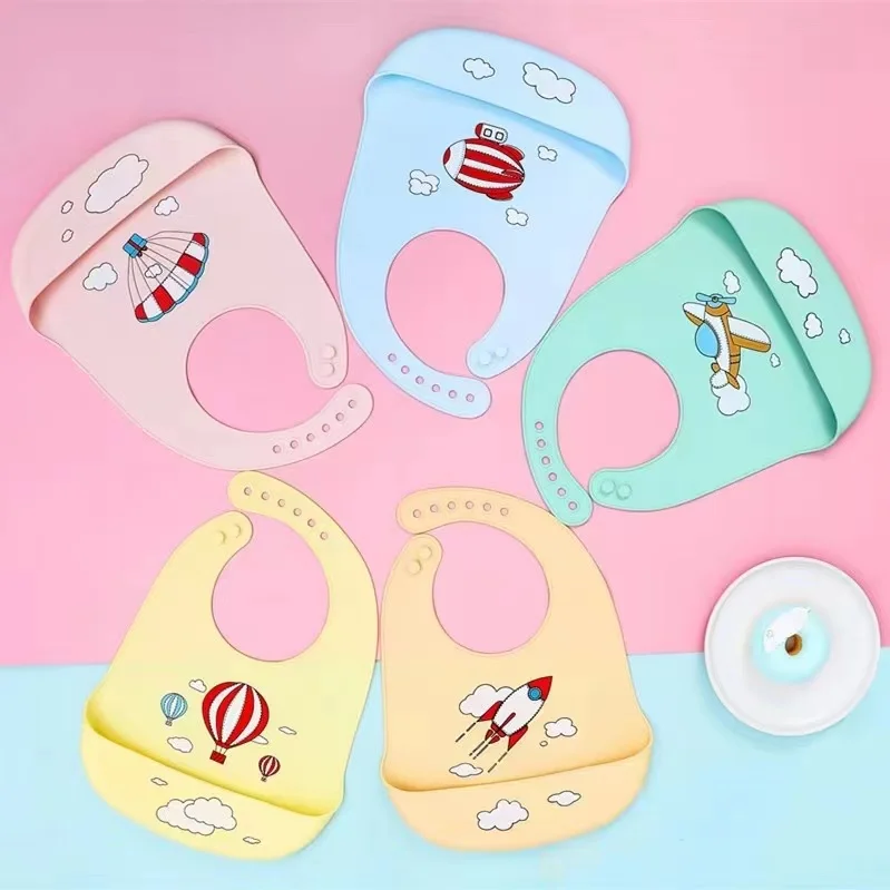 Waterproof Soft Baby Feeding Silicone Bibs Met Gala BPA Free Printed Silicone Baby Bibs For Kids