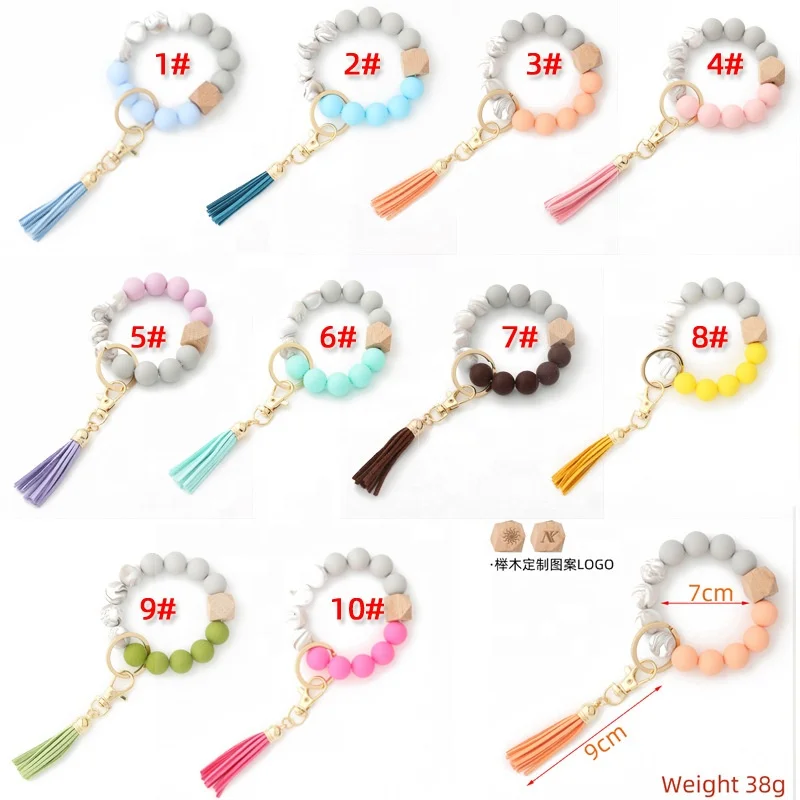 Amazon new bracelet key ring food grade silicone beads bracelet leather tassel wooden beads key chain for women