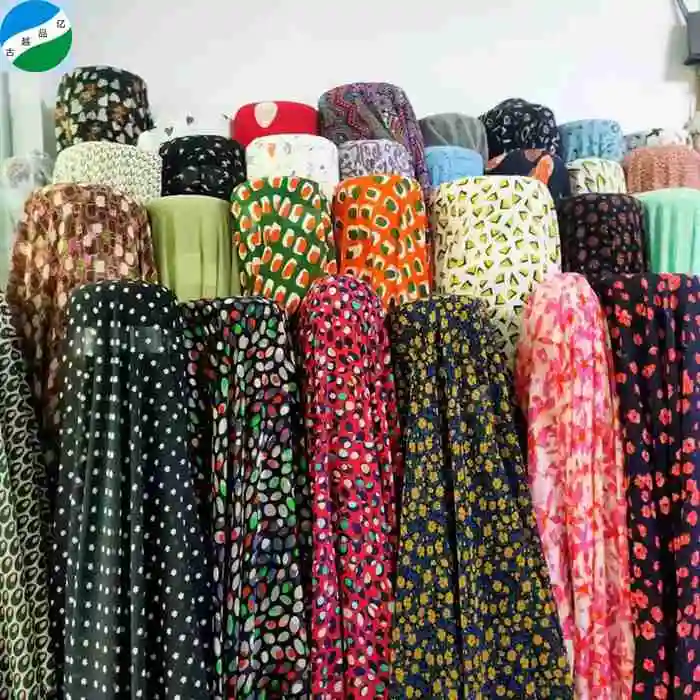 Good quality polyester woven printed pearl chiffon stock lot fabric for garment