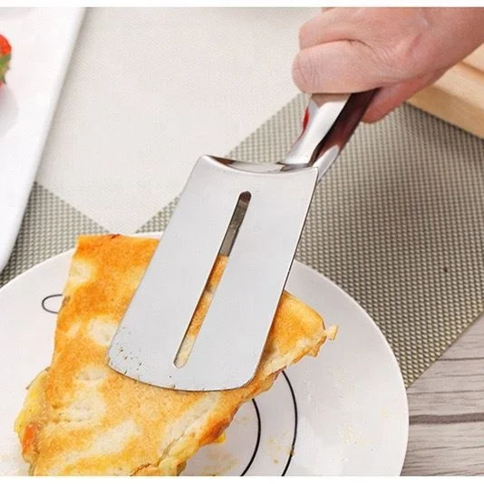 Stainless steel steak spatula barbecue with grilled fish with food with bread pancakes Korean barbecue fried fish with tongs