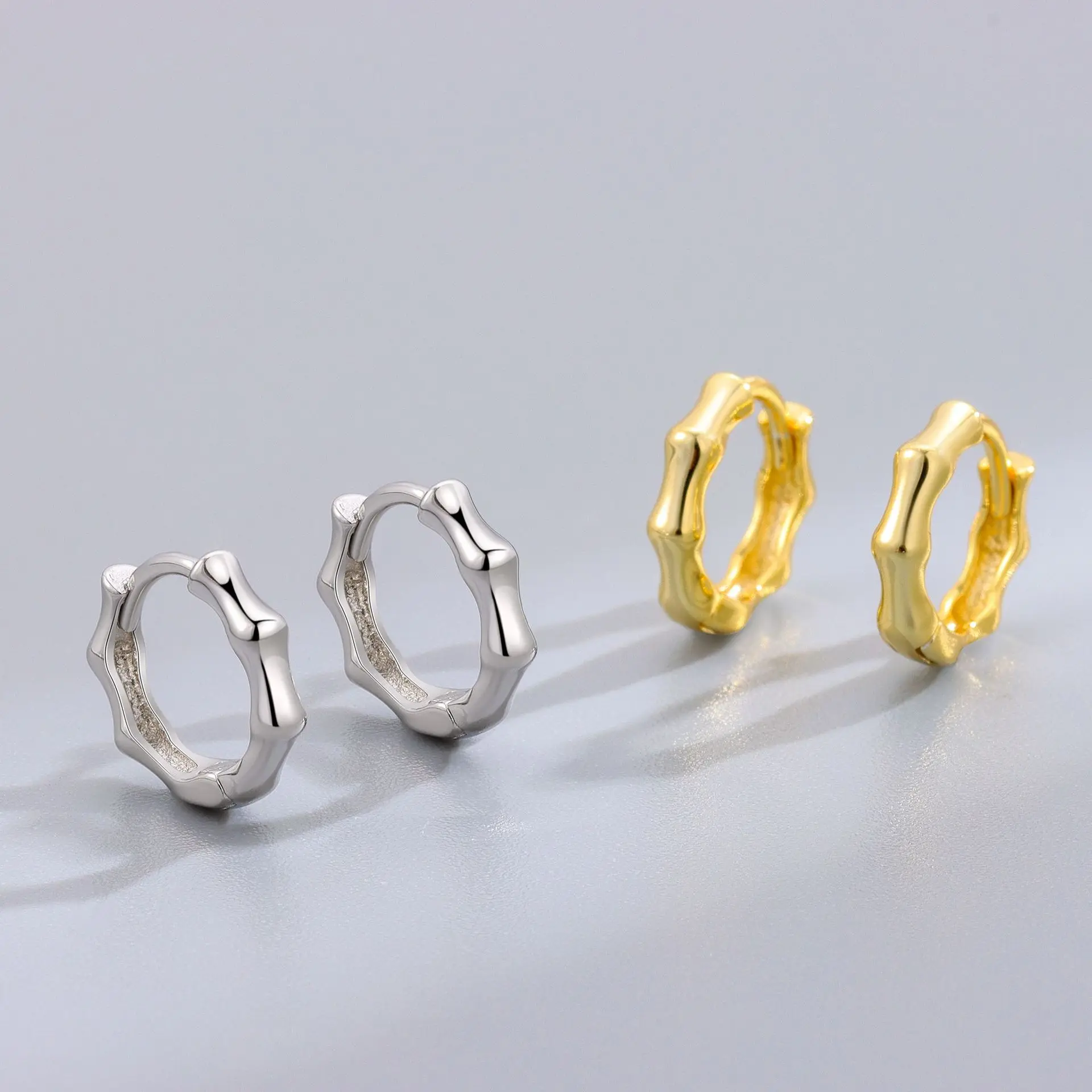 S925 pure silver bare body bamboo buckle simple personality temperament gold plated light luxury female small earrings INS style
