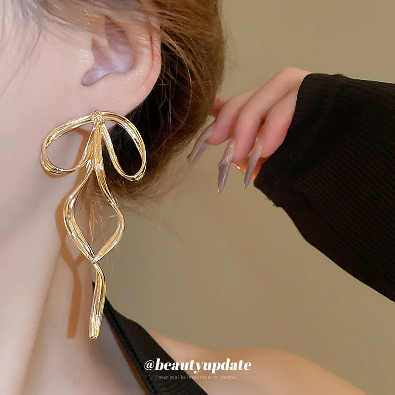 Silver Needle Metallic Twisted Ribbon Bowknot Stud Earrings Light Luxury Temperament European and American Exquisite High-Grade