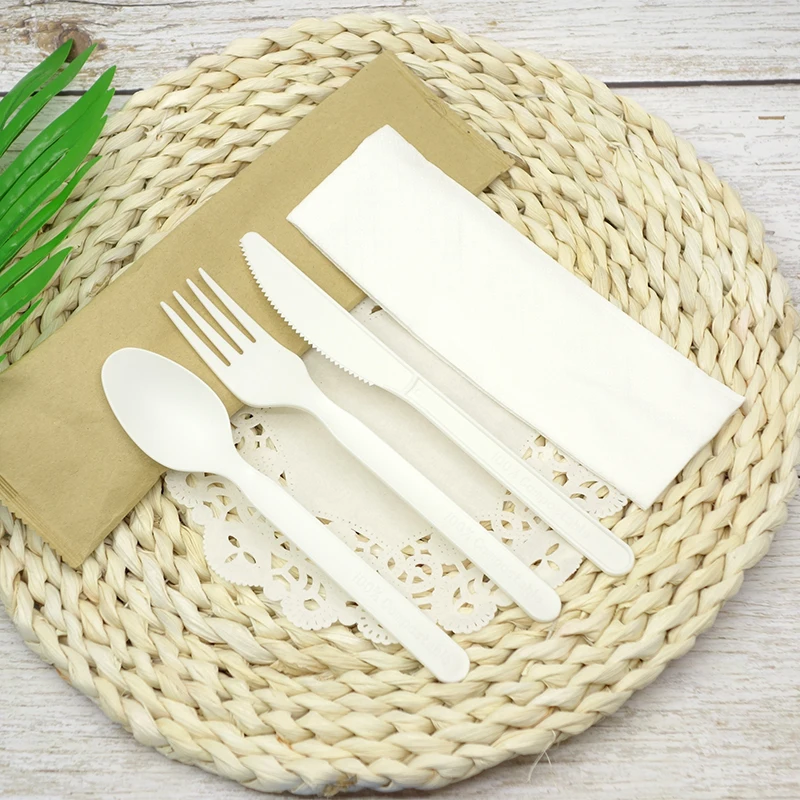 ECO FRIENDLY PRODUCTS Biodegradable spoon forks and knives go custom packaged CPLA cutlery