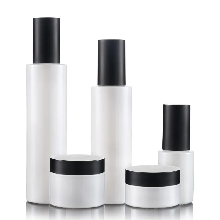 High quality Pearl white cosmetics pump glass bottle 30ml100ml120ml and 30g 50g cream jar set with matte black cap