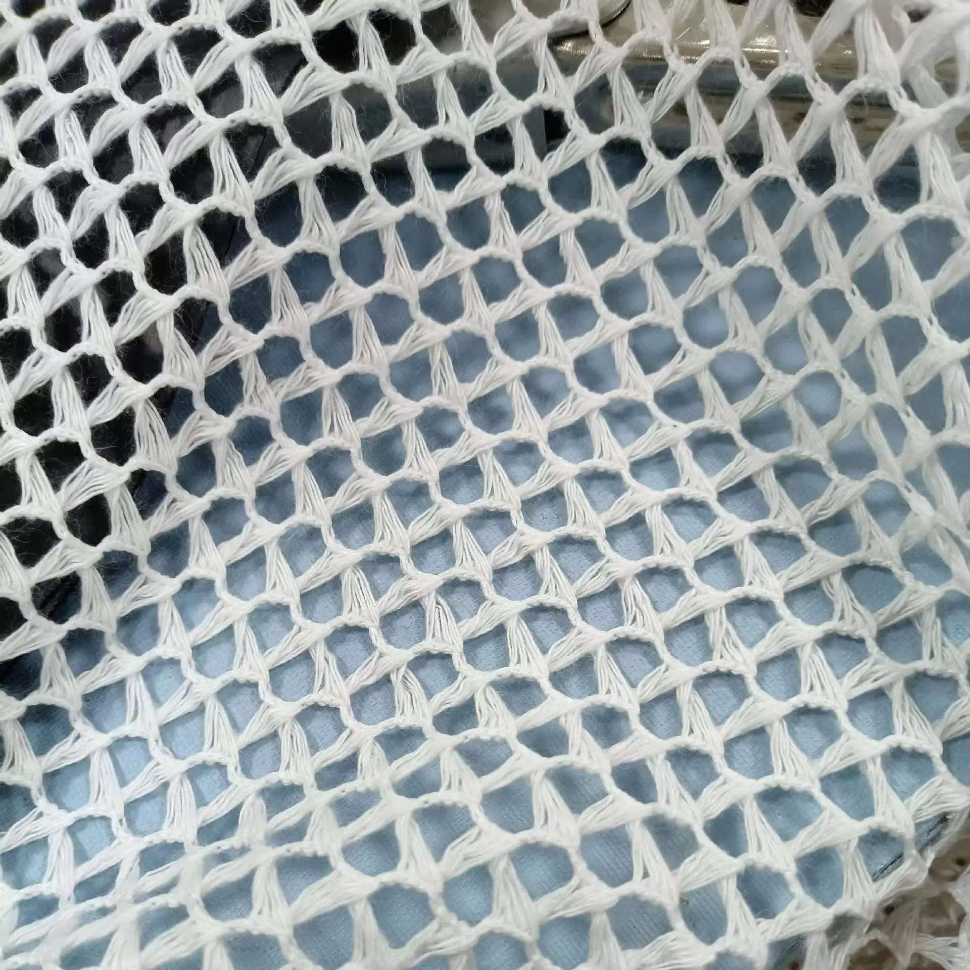 wave pattern crochet knitted fabric 3D jacquard swimwear fabric hollow breathable polyester fabrics for clothing women