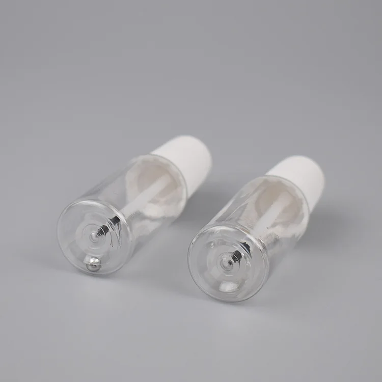 Empty  car repair paint  rpet  bottle with mixing ball and brush