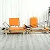 2023 Hot Sale Durable Beech Wood Pilates Reformer Home Gym Equipment with Folding Feature for Yoga Practice
