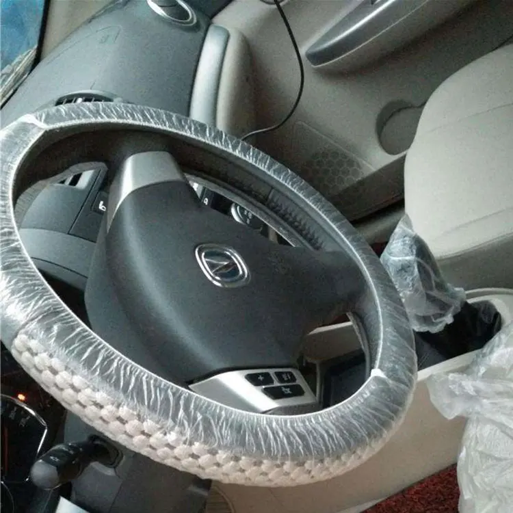 Одноразовый прозрачный пластиковый чехол на руль автомобиля белого цвета HDPE