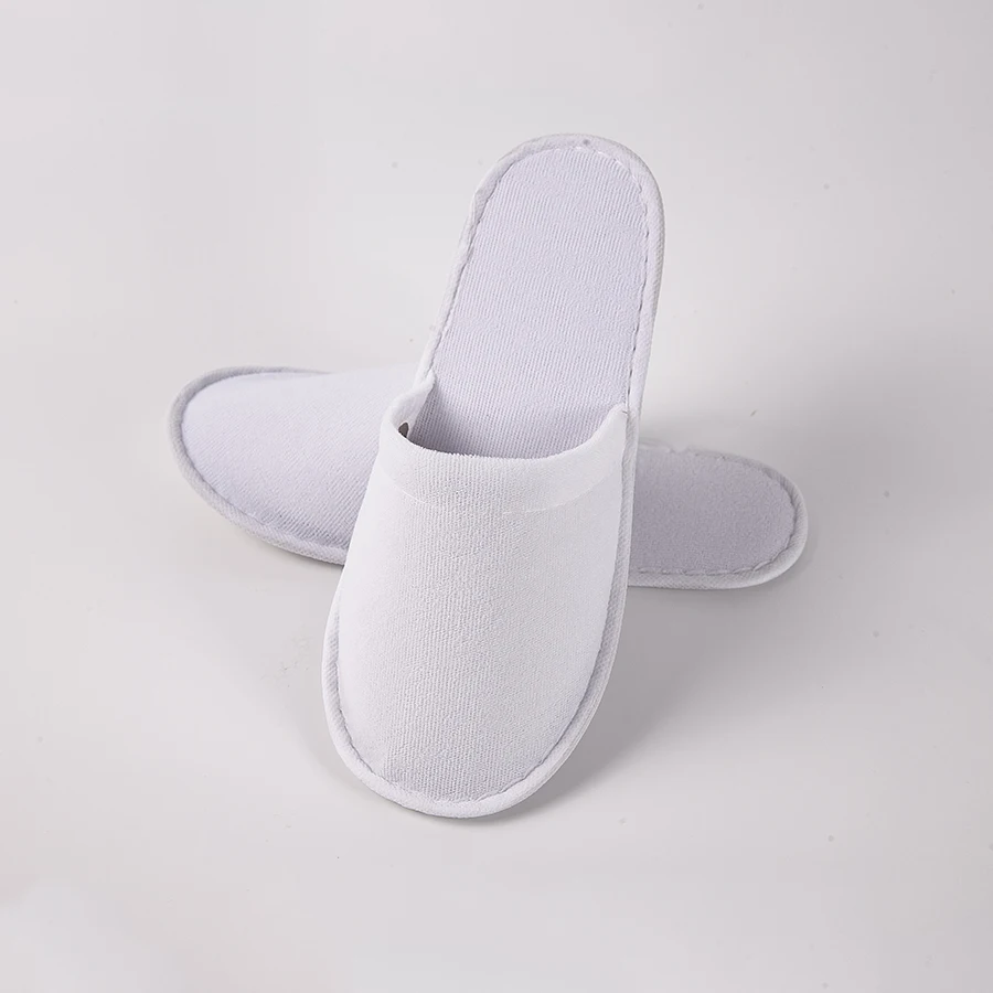 2023 hot selling custom logo anti slip sole terry towel upper hotel slippers white hotel disposable slippers