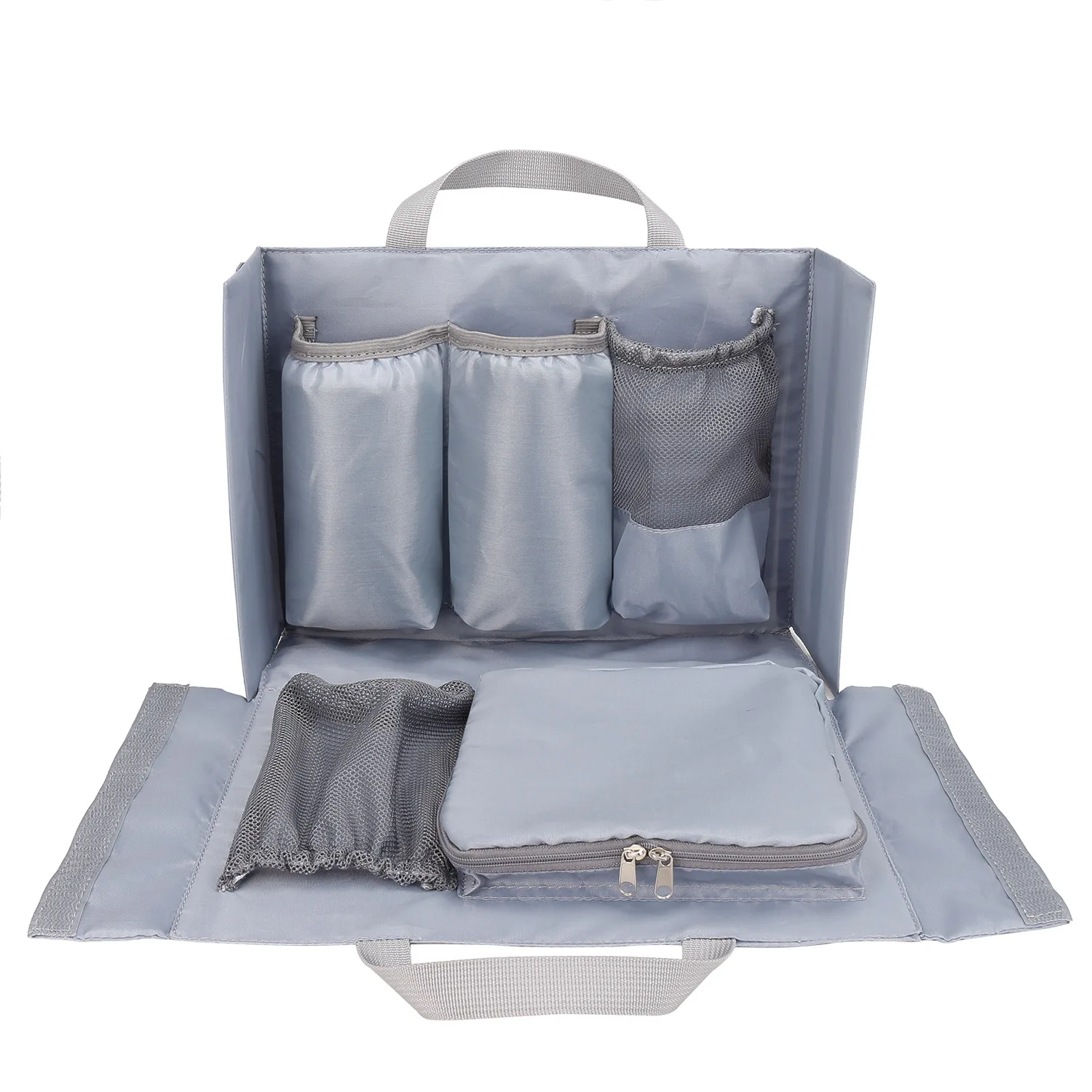 Detachable diaper bag liner with 6 total pockets, including an insulated pocket, keychain and washable changing pad.