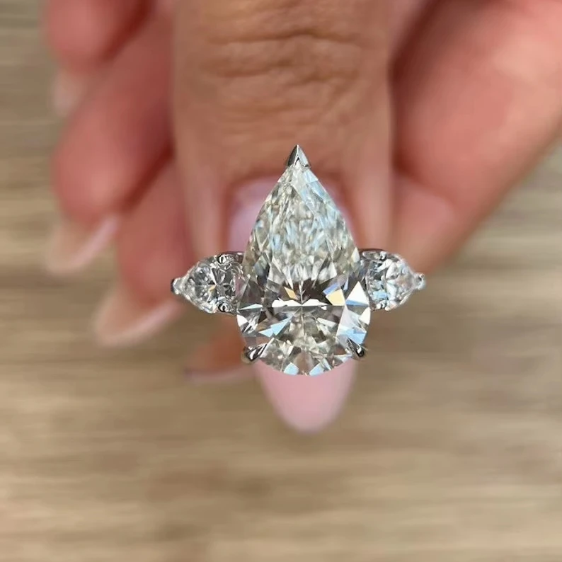 HUGE 7.00 Carat IGI Certified G Color VS1 Clarity Three Stone Pear Cut Lab Grown Diamond Ring