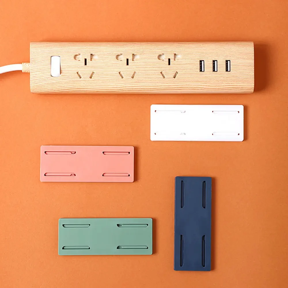 Hot Selling Convenient Hanging Wall Punch-free Plug-in Board Wire Plug-in Socket Wall Sticking Wall Mounted Socket Holder