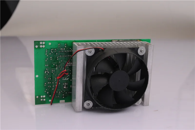 Induction heater connects coils to heat the plastic extruder