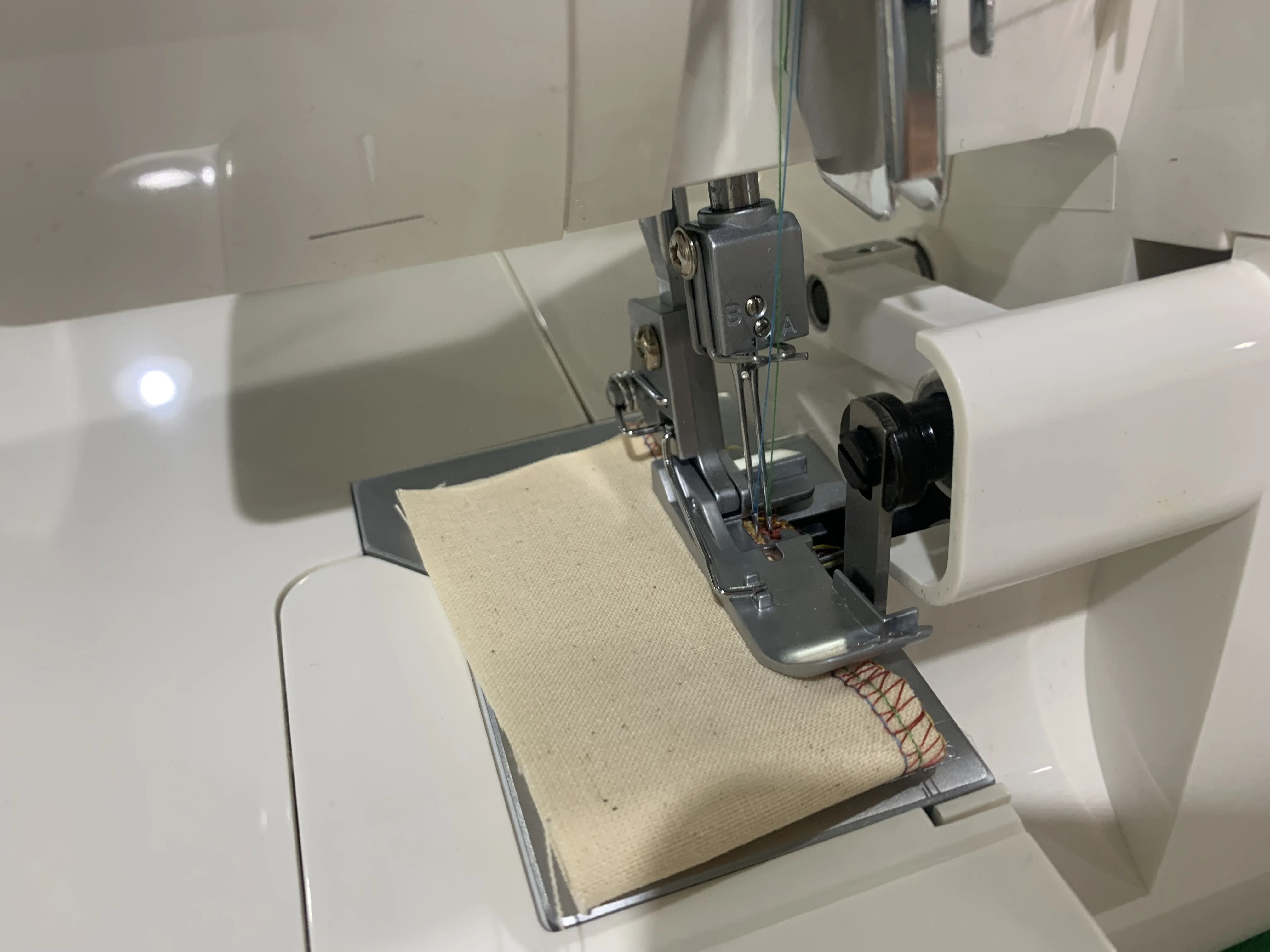 BT-703 electric portable hand held mini hand overlock sewing machine home