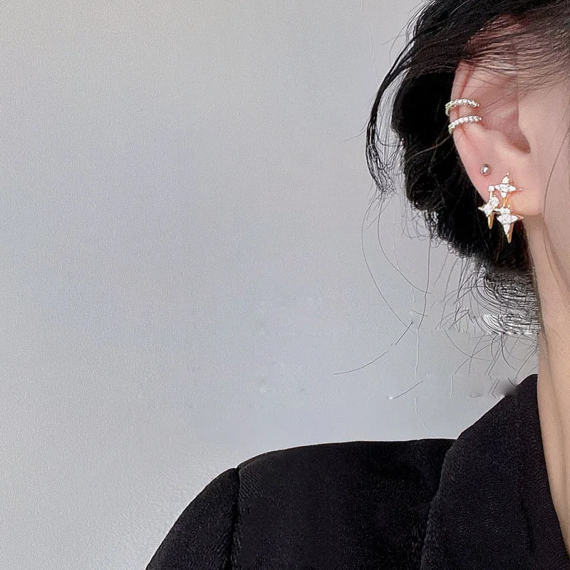 Diamond-studded star earrings Female silver needle niche design sense of high-grade temperament simple cold wind cross star