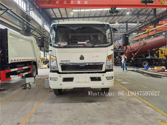 SINOTRUK HOWO мусоровоз с правосторонним приводом для продажи в Кении