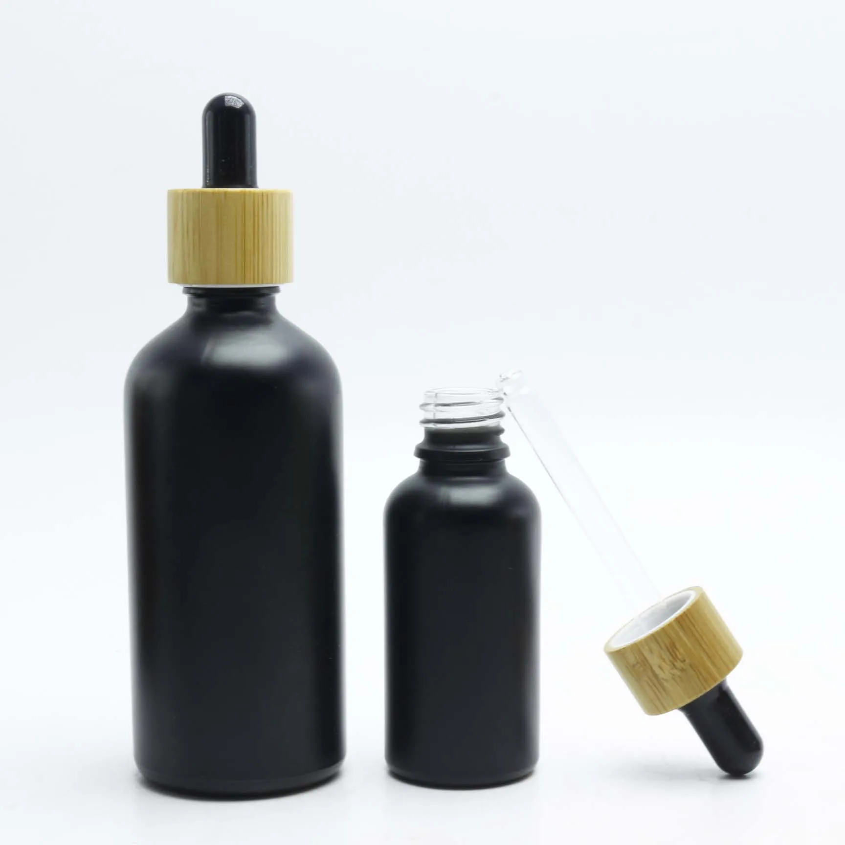 Best selling 30ml black frosted cosmetic bottle essential oil bottle with measurement pipette and paper tube packaging GB-AN35