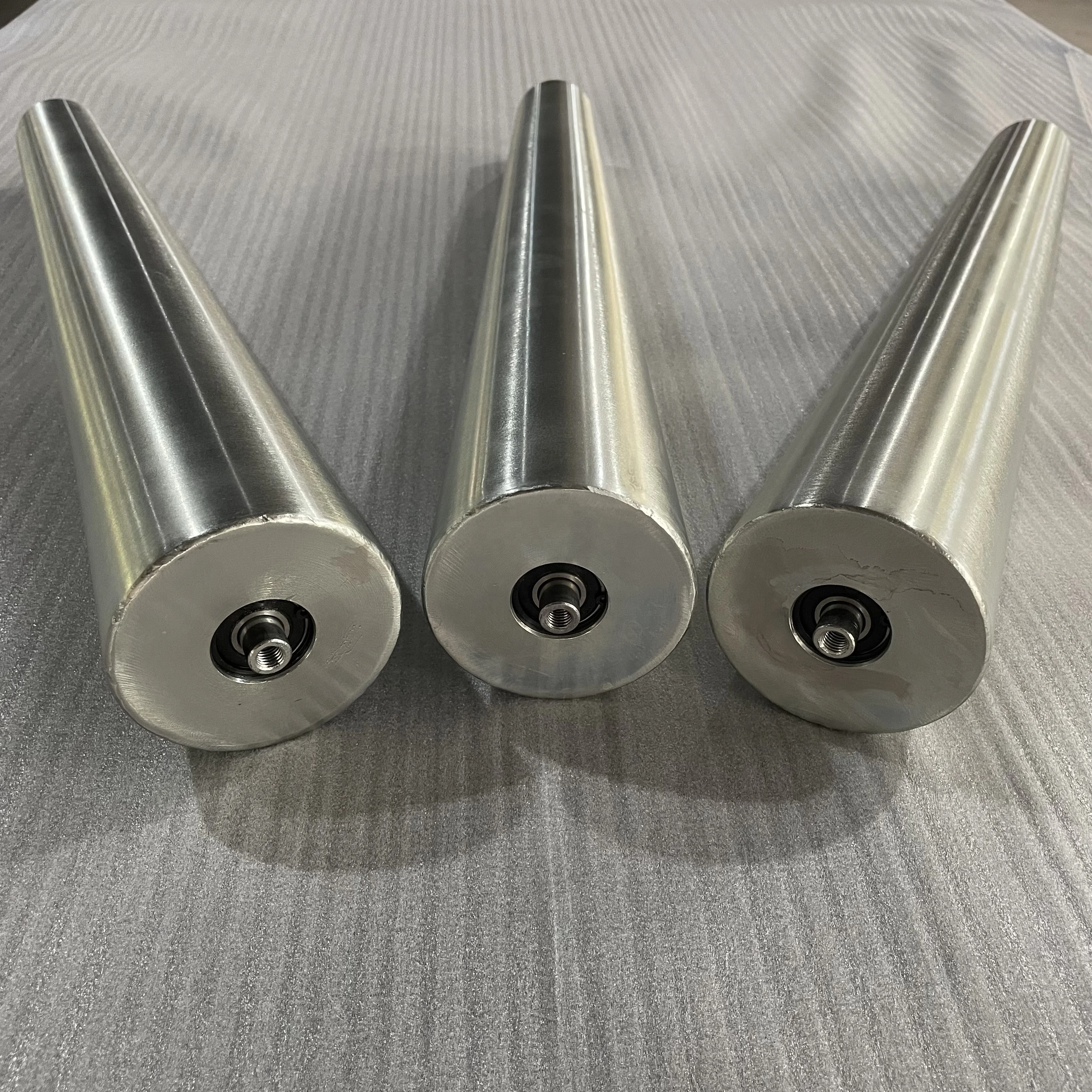 Taper low noise durable galvanized steel gravity roller