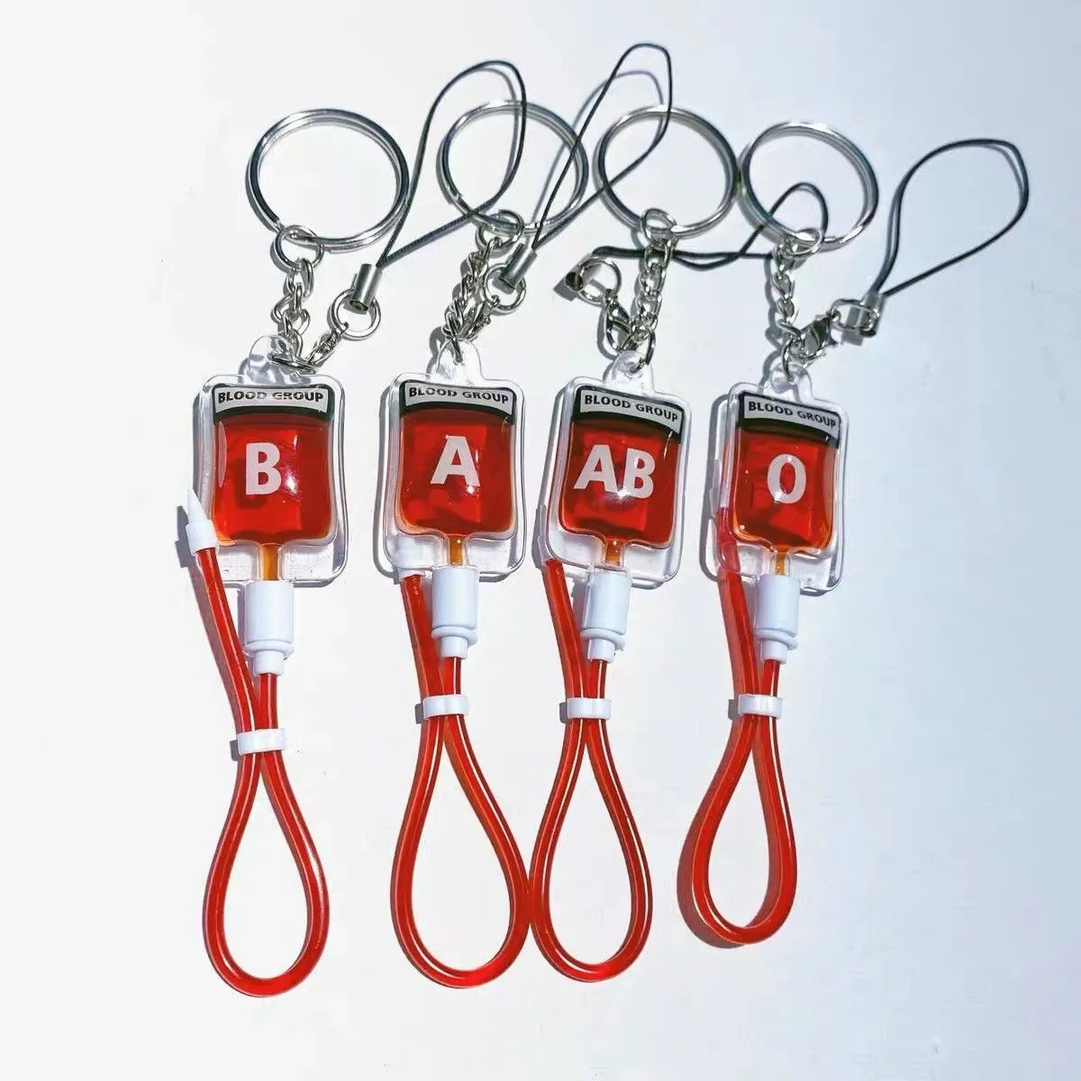 Hot new doctor nurse key chain Medical tools plasma blood bag key chain Personal blood type matching corresponding key chain