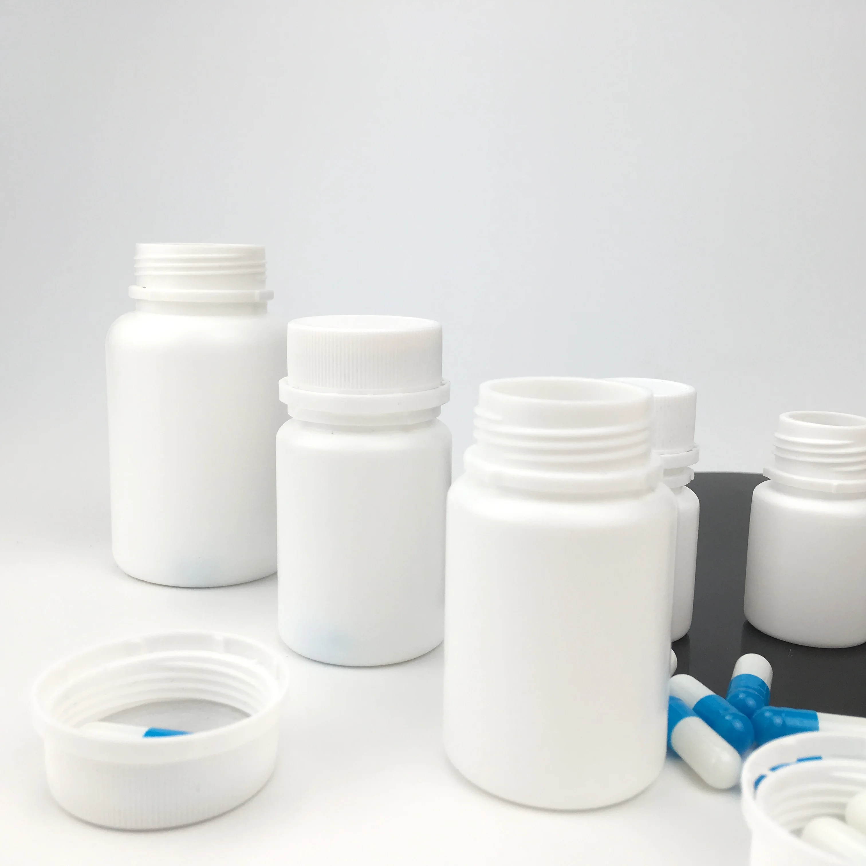 10ml 15ml 20ml 30ml 50ml 60ml 100ml 120ml 150ml 200ml HDPE White Pill Bottles Pharmaceutical Capsule Packaging Medical Bottle