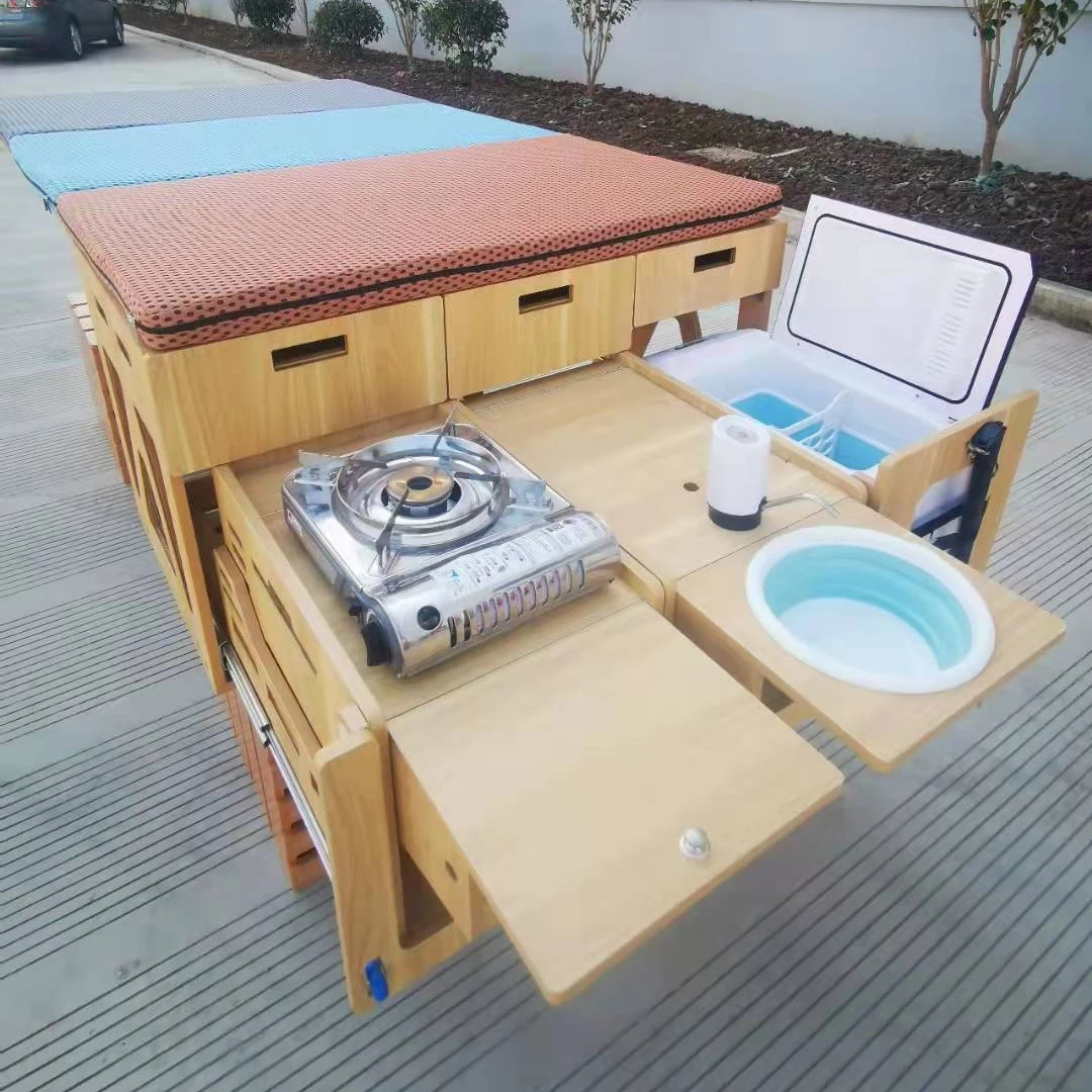 Caravan kitchen takeaway mini gas stove  LPG cooker in  RV Yacht Caravan motorhome kitchen with folding bed  outdoors