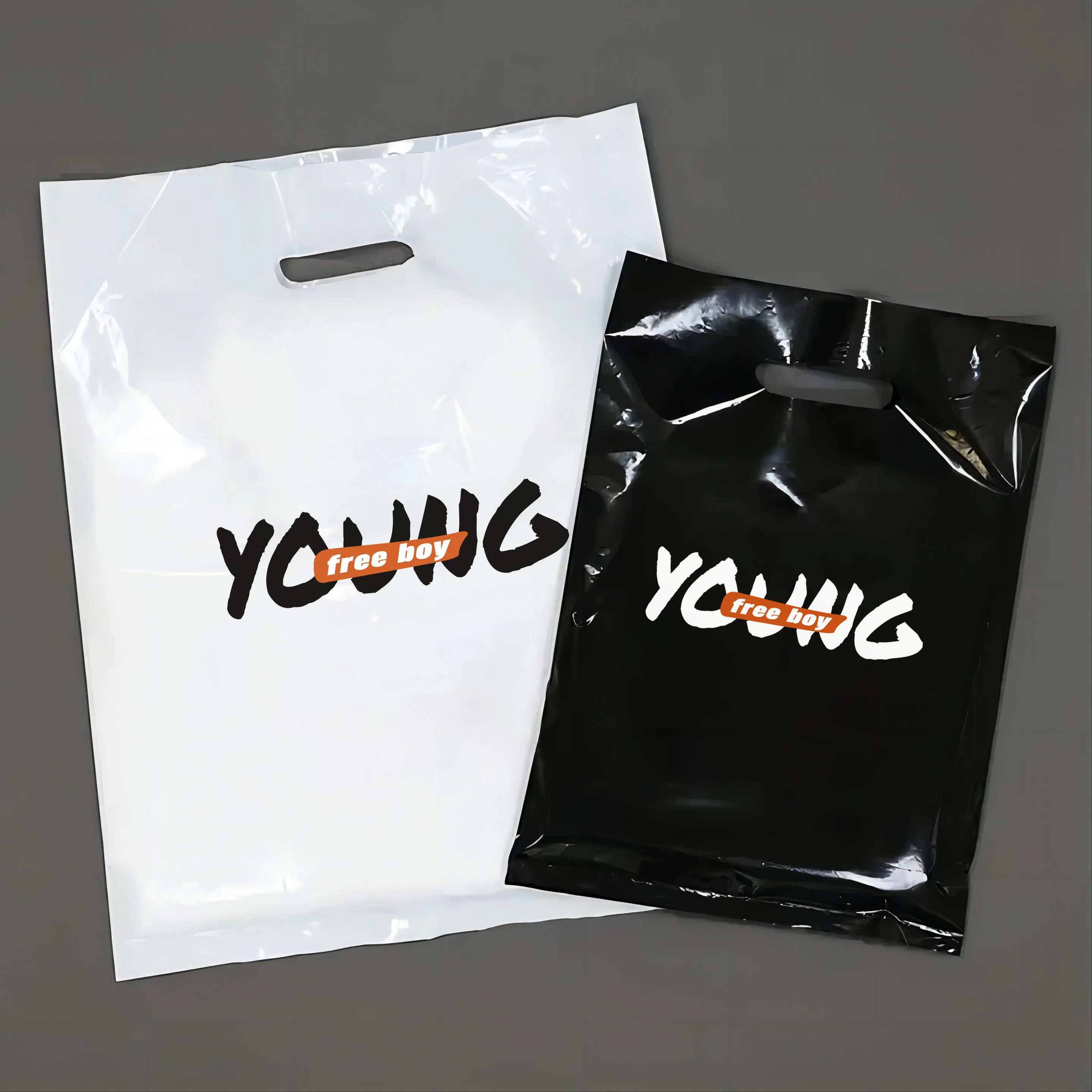 Recyclable LDPE Custom Transparent Plastic Bag Waterproof Die Cut Handle Bag Clothing Die Cut Plastic Shopping Bags