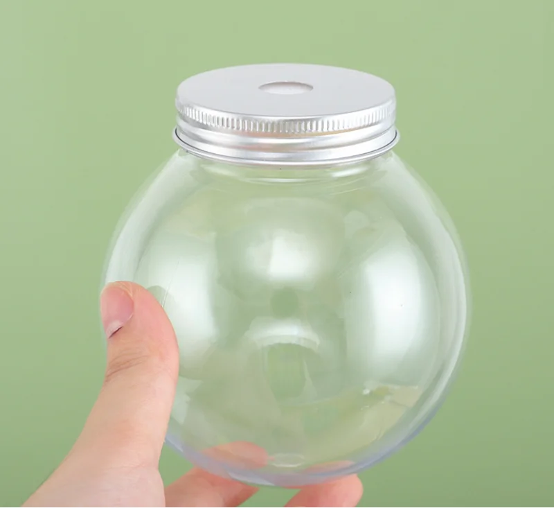Wholesale High Quality creative new disposable transparent round ball bottle for Beverage with Aluminum lid