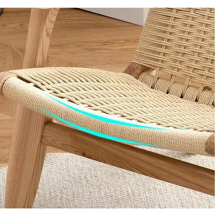Designers all over the world pursue Nordic rattan saddle chair solid wood back lounge chair