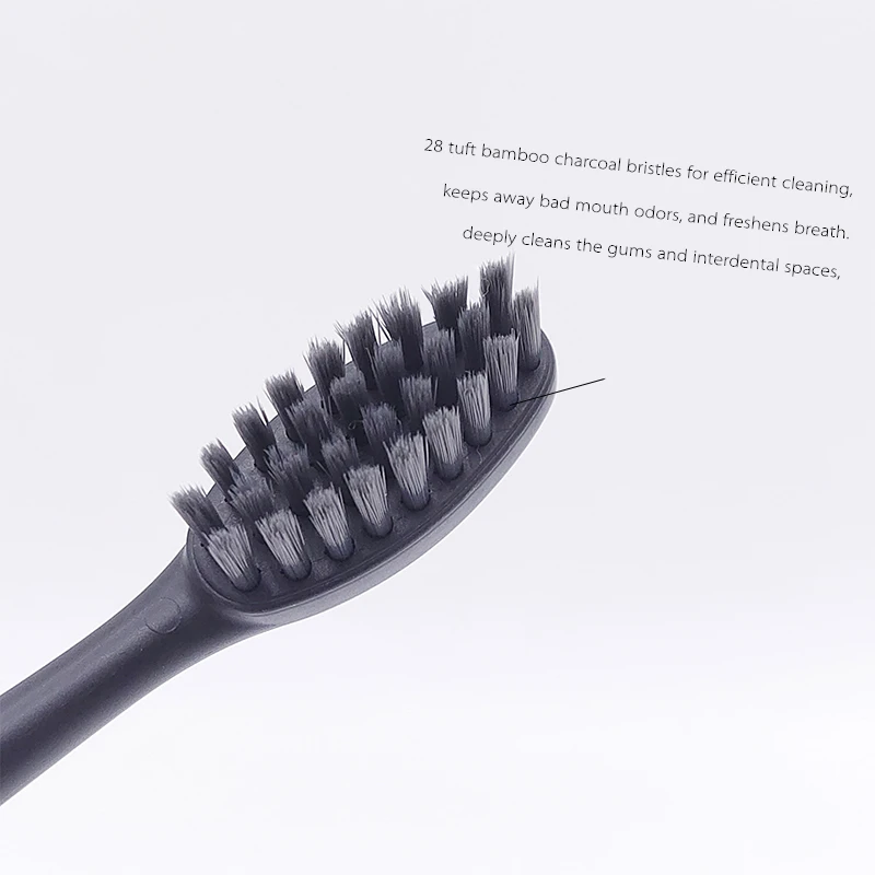 Wholesale custom logo black charcoal bristles pla / corn starch toothbrush with biodegradable eco friendly
