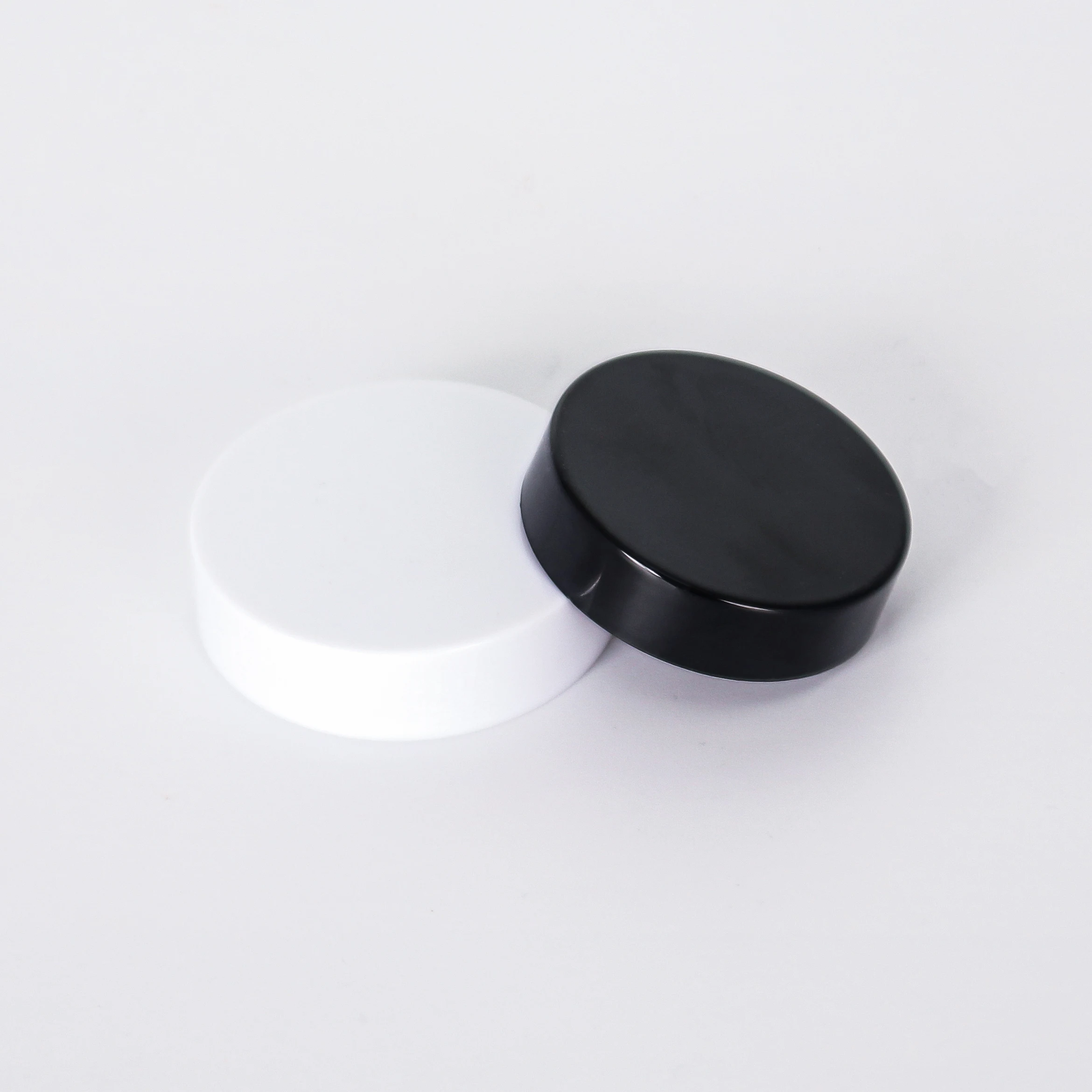 Neck 44mm neck 38mm black and white PP smooth caps  for packaging