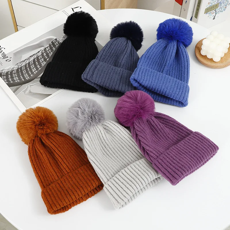 Autumn and winter double knitted running skiing knit cap Warm simple fashion solid color versatile wool beanie with Pom Pom