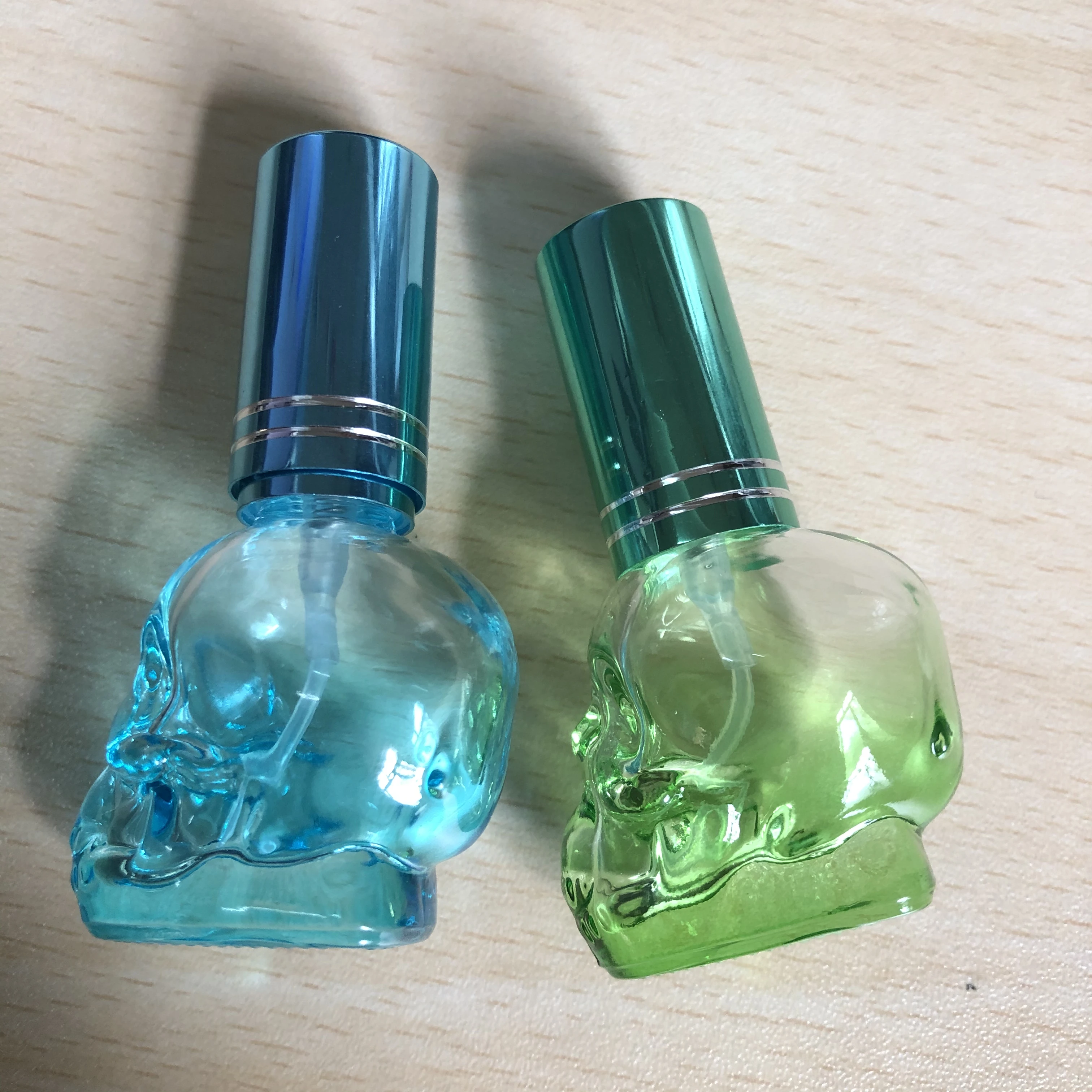 mini glass bottle 8ml skull shape perfume bottle