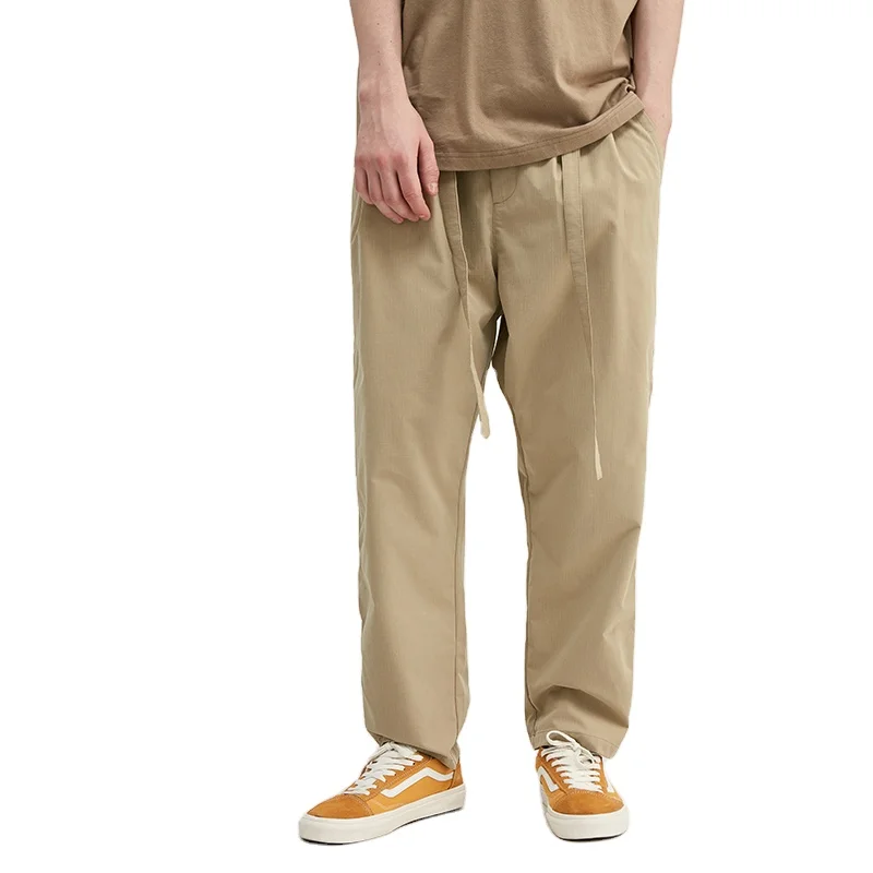 Breathable 100%polyester fibre men trousers loose elastic belt pants in men