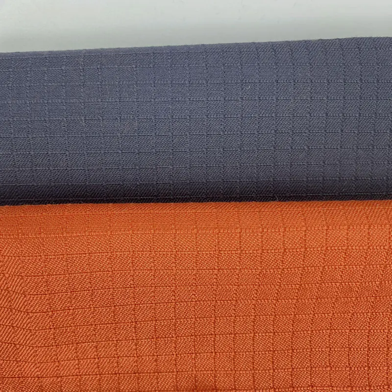 Оранжевая ткань ripstop 93% meta aramid 5% para 2% антистатическая Арамид