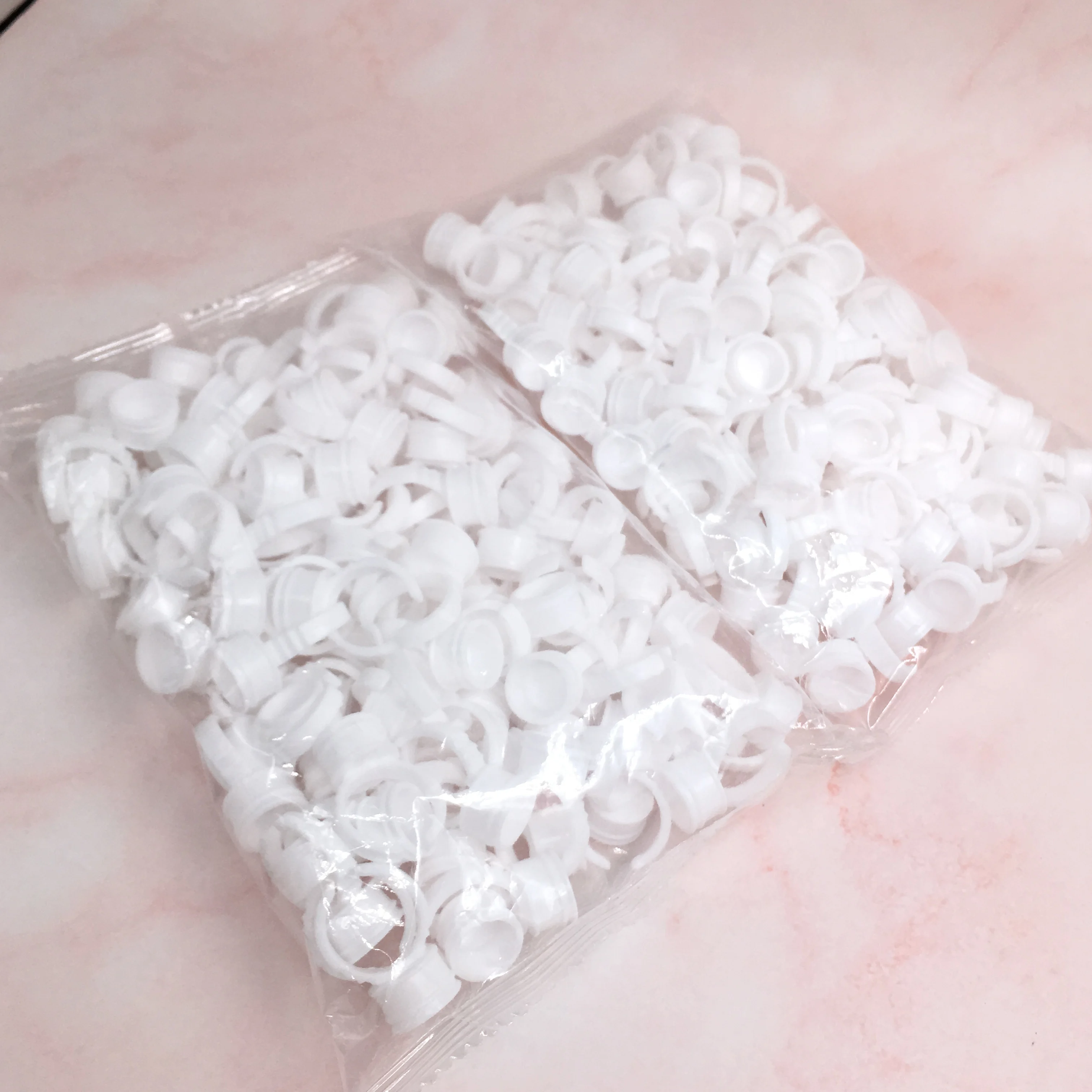 Wholesale Eyelash adhesive holder 100 pcs/pack Plastic Disposable Eyelash Extension Glue Plastic Eyelash Glue Rings