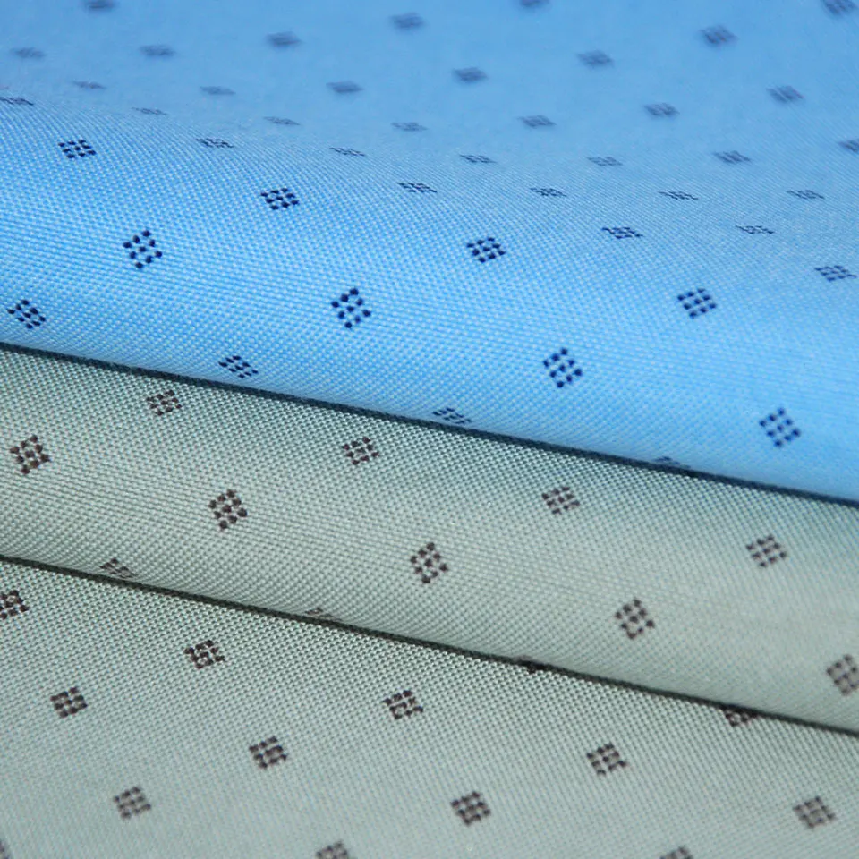 Wholesale high quality yarn dyed indigo chambray CVC 45% polyester 55% cotton print oxford fabric for men shirting