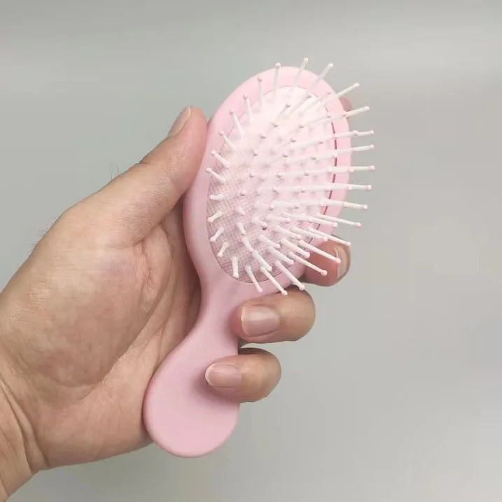 New Arrivals Hot Sell 2022 New  Cushion Pink Elastic hand Paint Hair Brush for Girls and women Exclusive