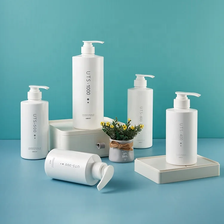 OEM Luxury flat shoulder plastic bottles 100-600 ml PET body lotion and shower gel containers with lotion pump free samples