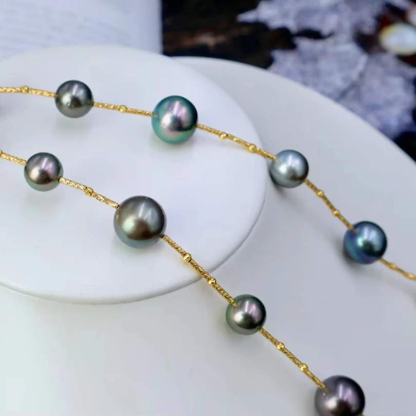 sea water real 18K gold material small large pearl arranged Tahitian tassel tail pearl necklace