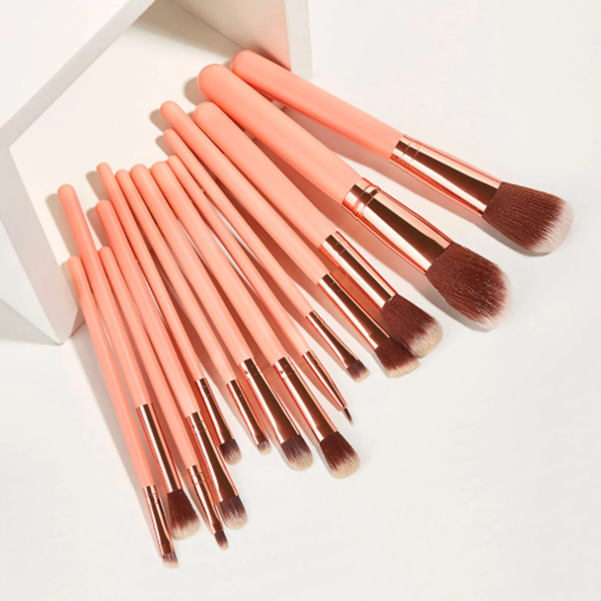 Luxury own logo customized Nude Pink 14pcs makeup brush set Vegan Synthetic hair Powder Foundation Lip brush