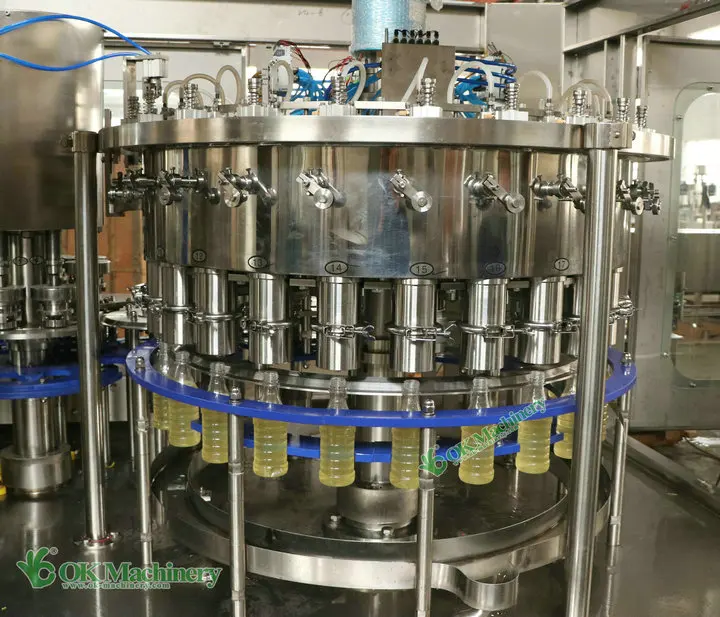 Automatic Rotary Type 0.5l-5l Pet Plastic Bottle Sun Flower Coconut Palm Oil Vinegar Filling Capping Labeling Packing Machine