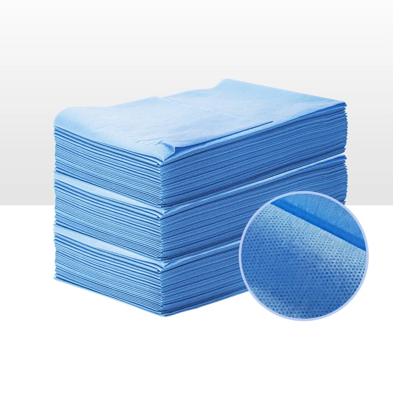 Fabric disposable nonwoven bed sheet roll
