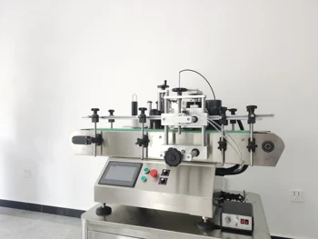 Small production line automatic milk Juice Cola Sprite round bottle positioning sticker machine