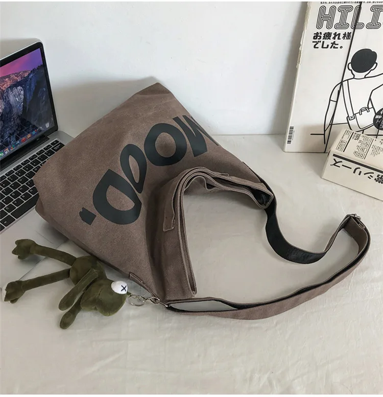 Wholesale custom printed letter shoulder bag large capacity fabric canvas zipper couple tote shoulder bag lazy style