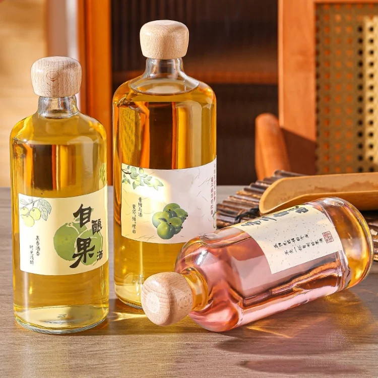 Top-ranking Products 500ml 700ml Transparent Round Glass Liquor Wine Vodka Tequila Bottle With Sealed Cork