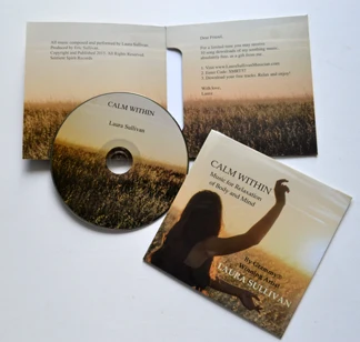 cd replication with printed cardboard sleeve packaging by shrinking wrapped