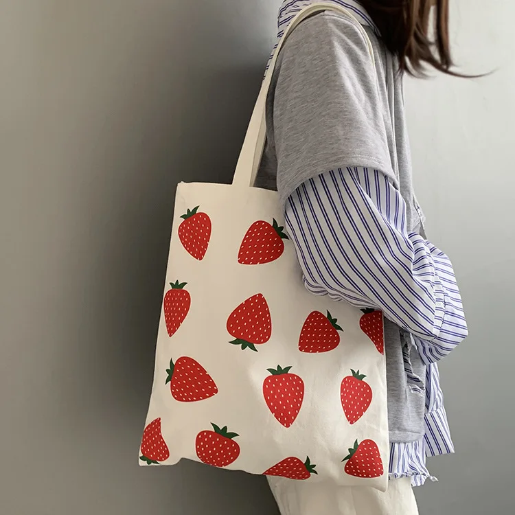 2024 new strawberry printed canvas bag, college student ins shoulder bag, large capacity canvas book bag