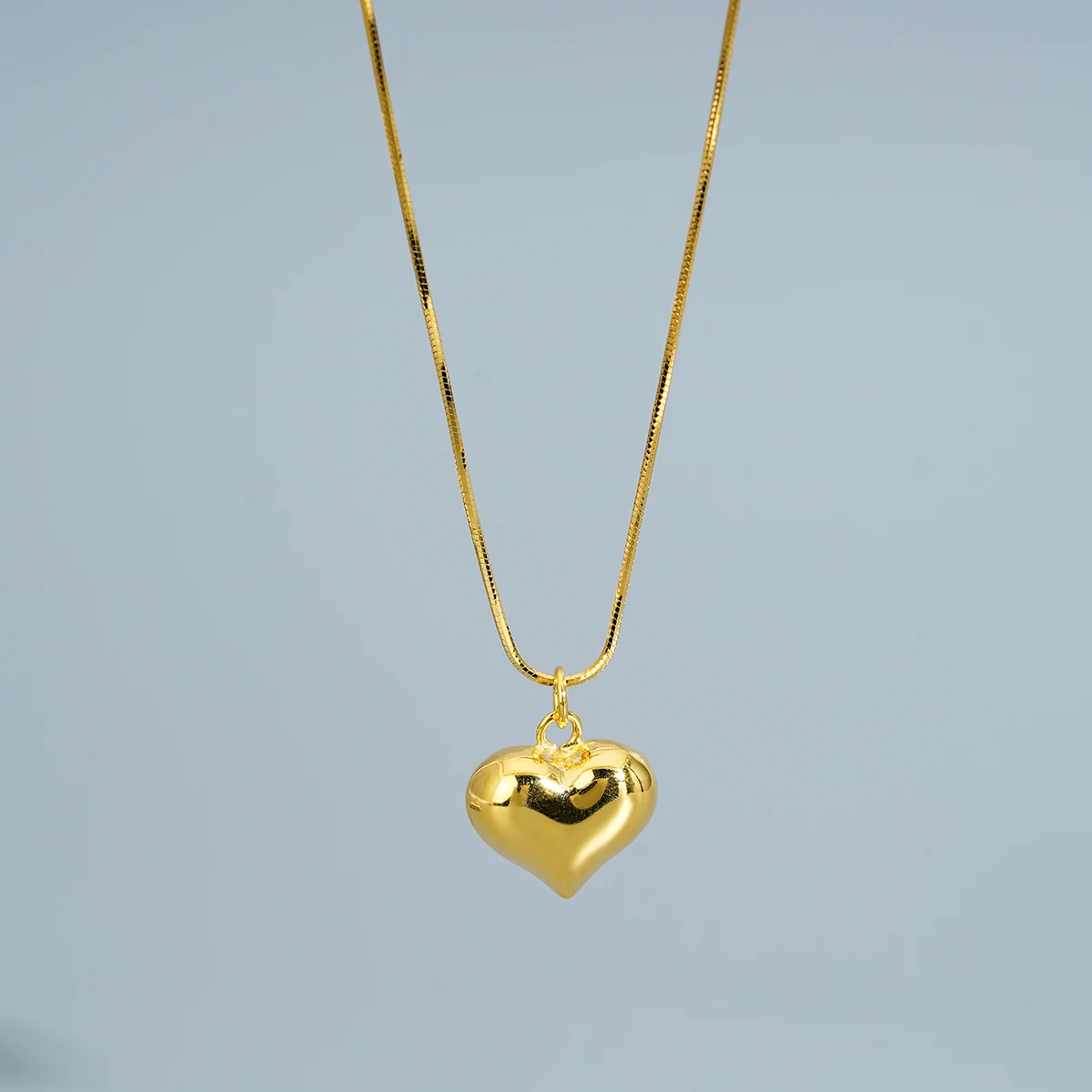Ожерелье с кулоном в форме сердца
