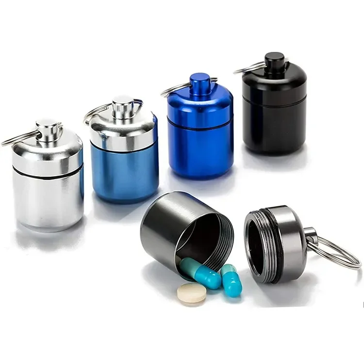Custom Logo emergency bottle key chain pill case Metal Earplug Case Waterproof Travel Pill Case Mini Storage Capsule Container